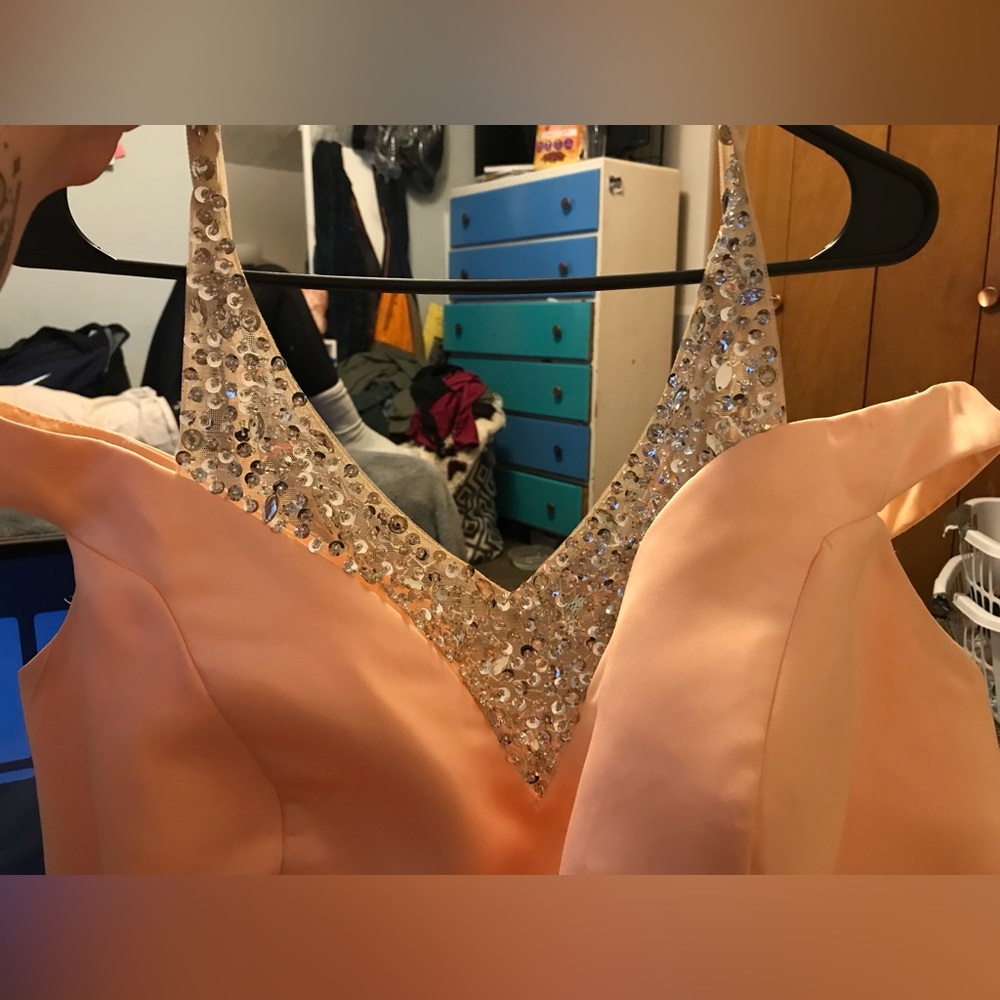 Vnaix floor length custom sized wedding gown in rose gold. Worn twice ever